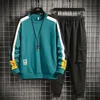 Mężczyźni Autumn Zima 2-częściowy zestaw Casual Sports Wear Men Tracksuit Korea Fashion O-Neck Koszula i spodnie dresowe.