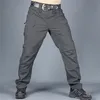 メンズカモフラージ貨物パンツエラスティックマルチポケットミリタリーオスのズボン屋外ジョガーパンツプラスサイズ戦術的な男性220524
