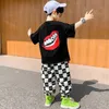 Vestidos de roupas vestido de verão garotos traje coreano 2022 Big Children Children calça xadrez de mangas curtas esportes de moda TIDEC de duas peças