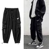 Mannen Zomerkleding Zwarte vrachtbroek Zweetbroek Korea Dent Techwear Hip Hop Joogers Men Men Ribbon Homme broek broek voor mannen G220507