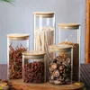 ガラス貯蔵容器密封された竹のふたが付いている瓶は、ティーコーヒーを提供するための透明なメガネ食品保管キャニスター