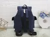 디자이너 Christopher Slim Men Backpack Bag Denim Leather Double Stitched Flap Strap Travel Luggage Laptop Tote Satchel Shoutherbag Purse