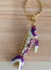 10pcsリアルなスイングエナメルかわいい4.5cmの女性用魚のキーチェーン子供ギフトkeyrings kisrings cloisonne goldfishチャームファンシーキーズチェーン