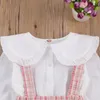 Lovely Kids Baby Girls Clothes 2pcs Suit Peter Pan Collar Long Sleeve Shirt Plaid Suspender kjol för Autumn Spring Outfits 2 7y 220620