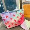 Dames luxurys ontwerpers bakken onthego boodschappentassen topkwaliteit game op handtas gradiënt shouder crossbody tas echte lederen dames handtassen 33 cm