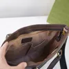 Pastas masculinas Bolsa Clutch Carteiras Homens Antiga Bolsa Flor Envelope Carteira de Couro Genuíno Moda Clássica Hardware Letras Interior Bolso com Zíper Bolsas de Alta Qualidade