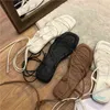 Designer- Kvinnor Sandaler Fashion Sexig Summer Cross Tie Boho Beach Open Toe Shoes Flat smal Band Black Casual