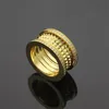 Klassischer Designer-Spring Gear-Diamantring aus Edelstahl, 18 Karat vergoldet, Paarringe, modische Eheringe für Männer und Frauen