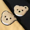 Дизайнерские ладони капюшона негабаритная винтажная роскошная мода черная осень и зимняя хлопковая стрижка медведя медведя полотенце вышивка круглой шеи