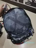 2022 Mochila de emenda de designer clássico bolsas de lazer esportivas masculinas e femininas lona camuflagem bolsa de viagem handabg mochila escolar de grande capacidade