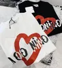 Niños graffiti carta camisetas Moda lentejuelas corazón niñas niños algodón manga corta Camisetas verano Diseñador niños ropa suelta tops tamaño 100-140 cm