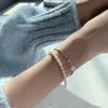 Charm-Armbänder Design, Modeschmuck, natürliche Süßwasserperle, elastische Kordel, doppelte Schleife, verstellbares Armband, elegante Damen-Lars22