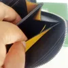 Portefeuille de créateurs de femmes classiques Small Mini Mini Glipotage courte portefeuille de luxe avec une surface supérieure en toile enrobée avec un vrai 167a