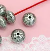 Tybetańskie srebrne wisiorki do otworów ręcznie robione dekoracyjne metalowe akcesoria biżuterii DIY SWG4QW
