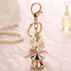 Keychains Lanyards Söt nyckelring Pearl Crystal String Carousel for Women Key Chain Jewelry Presenttillbehör Llaveros Para Mujer Drop Ship