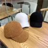女性用の冬の帽子男性ウール野球帽は暖かい純粋な色の帽子の卸売りを厚くします