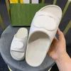 Designer macaron tofflor kvinnor glida sandal med sammanlåsande mens toffelplattform glida platt tjock botten flip flops lyx sommar utomhus glider storlek 35-45