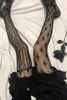Damen-Socken, Strumpfwaren, asymmetrische Lolita-Strümpfe, Persönlichkeit, große Größe, Fischnetz-Design, fühlen Sie sich cool. Coole dunkle Jacquard-Strumpfhose der Marke Kullo