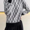 デザイナー高品質の丸い首の女性のニット長袖ファッション黒と白のパターンf文字ニットトップセーター
