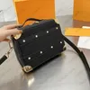 M59669 HANDEJA DE Designer Bolsas de ombro macias de tronco amarelo 7 Mensageiro Monogramas de corpo cruzado espelhar letras de couro em relevo bolsas mini mini