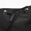 Designer Re-nylon Backpack Mackpack Bolsa de viagem preta bolsa de zíper esmaltado Triângulo de metal de metal para caminhadas ao ar livre com esportes de grande capacidade 32-30-15cm