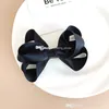 Temperamento ragazza principessa Barrettes grande arco bambini bowknot fermaglio per capelli Corea bambini torsione fiore copricapo top clip ornamenti B303