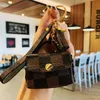 Plaid cuir porte-clés anneau bijoux marron gland sans fil Bluetooth casque étui voiture porte-clés titulaire mode porte-clés accessoires mignon