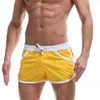 Été plage porter nouveaux hommes sport conseil shorts mode homme et femmes shorts décontractés mince flèche pantalon Y220420