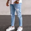 Jeans para hombres hombres de color claro de color racial estiramiento delgado pantalones delgados agujeros de hip hop machos elegantes pantalones de mezclilla casual de mezclilla