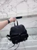 2022 Moda Unisex Sırt Çantaları Tasarımcı Torbalar Top 5a Kaliteli Seyahat Çantaları Lüks Küçük Yeniden Nynyon Sırt Çantası Çok Cocle Toka Taşınan İki Ön Flep Cep