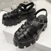 Sandali in gommas iconic Monolith black rubber sole sandal reimagined modernist style Double Soul This shoe is made of rubber for a fun and modern look