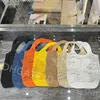 Série de praia Hollow Out Tote Bag Style Stravo Teclagem Crie designers de luxo bolsas de ombro bolsas de embreagem cruzadas Cartas de tricô de verão Bolsas claras