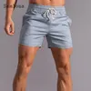 Män s casual shorts sexig fritid korta byxor gröna svart lapptäcke snörning pocket sommar mode strand man kläder 220630