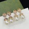 Designer 925 Silver Pin örhängen dinglar guld charm örhängen för kvinna diamantform örhänge av hög kvalitet mässingsmodesmycken leverans