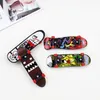 Fingers Exercise Toy Mini Desktop Fingertip Skate Boarding Creative Graffiti Skateboard Finger Plastic Fingerboard Hand Wrist Childrens