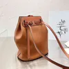 Designer Bag Top Quality Lychee DrawString Bucket Tote Color Matching Handväskor Kohide DrawString Bucket Casual Lady Shopping Purse 240325