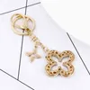 2021 Exquis Clover Key Chain Creative Full Full Rinestone Keychain Fashion Course Femme Bag Sac Charme Pendant Car Key Anneau entier A4818521