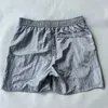 Shorts Masculinos Cor Sólida Moda Forro de Secagem Rápida Shorts Movimento Solto Cinco Calças Tide