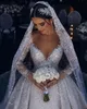 Lyxig bollklänning Bröllopsklänningar Sexiga stropplösa rufsar rygglösa spetsar långa ärmar v halspärlor paljetter applikationer diamanter arabiska brudklänningar