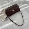 مصمم-جديد أزياء المرأة الكتف اللون الصلبة متعددة الاستخدامات حقيبة صغيرة حقيبة صغيرة حقيبة الإبط المعدنية