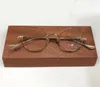 Nya optiska glasögon 8112 Design Eyewear Round Metal Frame Retro Enkel stil Klar lins Toppkvalitet med Case Transparenta glasögon