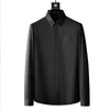 男性長袖スリムカジュアルシャツブラックホワイトビジネスフォーマルドレスソーシャルタキシード服220322のための高級刺繍のシャツ