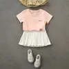 Ropa de verano para niños Niñas Falda corta Niñas bebés Todo-fósforo Falda plisada Pantalones cortos Niños Moda Falda casual Q118 220707