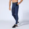 Profesyonel Siyah Sıkıştırma Koşu Tayt Erkekler Jogging Pantolonla Telefon Cep Fitness Eğitimi Uzun Pantolon Spor Spor Salonu Tayt 220509