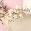Anneaux de nombril en forme de fleur de Zircon brillant pour femmes, anneaux de nombril en acier inoxydable, Piercing corporel, bijoux ornements à la mode