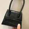 Lüks tasarımcılar çanta kadın omuz crossbody flep çanta çanta çanta çanta cüzdanları totes elleçli postmen yamuklu hasp düz renkli sırt çantası çanta