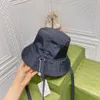 Designers bucket hat fashion klassieke vissershoeden kunnen aan beide kanten gedragen worden voor mannen en vrouwen. Het is geweldig om te combineren met krimpband voor zeer goede schaduw