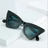 2022 Bright black cat eye sunglasses for women Fashion casual glasses wholesale Men are suitable for leisure sunshade mirror UV400