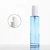 Emballage Vide Verre Clair Bleu Bouteille Épaule Plate Couvercle Blanc Blanc Presse Pompe Portable Rechargeable Emballage Cosmétique Conteneur 20 ml 30 ml 40 ml 60 ml 100 ml 120 ml