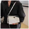 The new chain small square bag 2023 mirror laser underarm is simple and sling one shoulder oblique span women's clearance sale